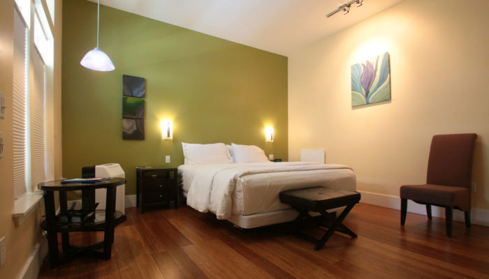 All rooms have a California King bed as shown, except Room 101 which has a queen size bed.